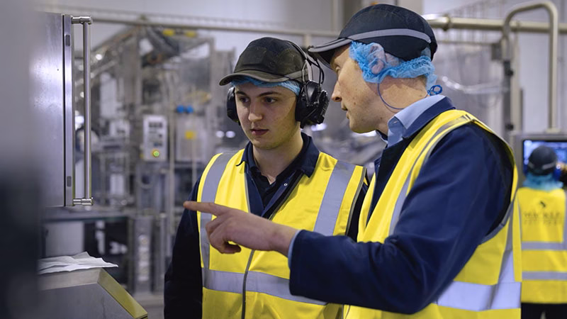 Mackle Petfoods production team inside the wet pet food manufacturing facility